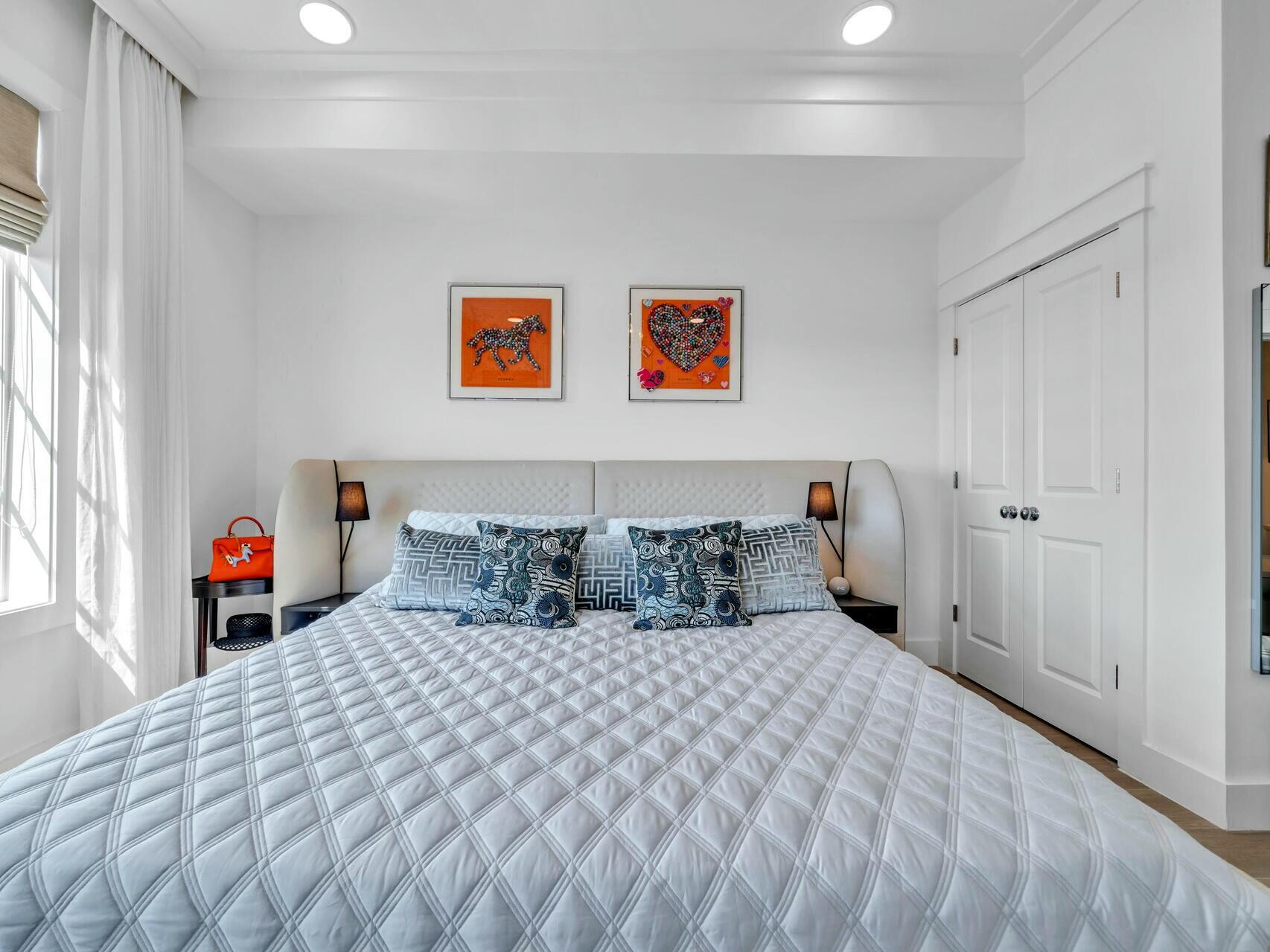 206 Henderson Resort Way, Unit 5202 Destin, FL 32541 - Photo 21 of 55 a bedroom with a large bed and a window