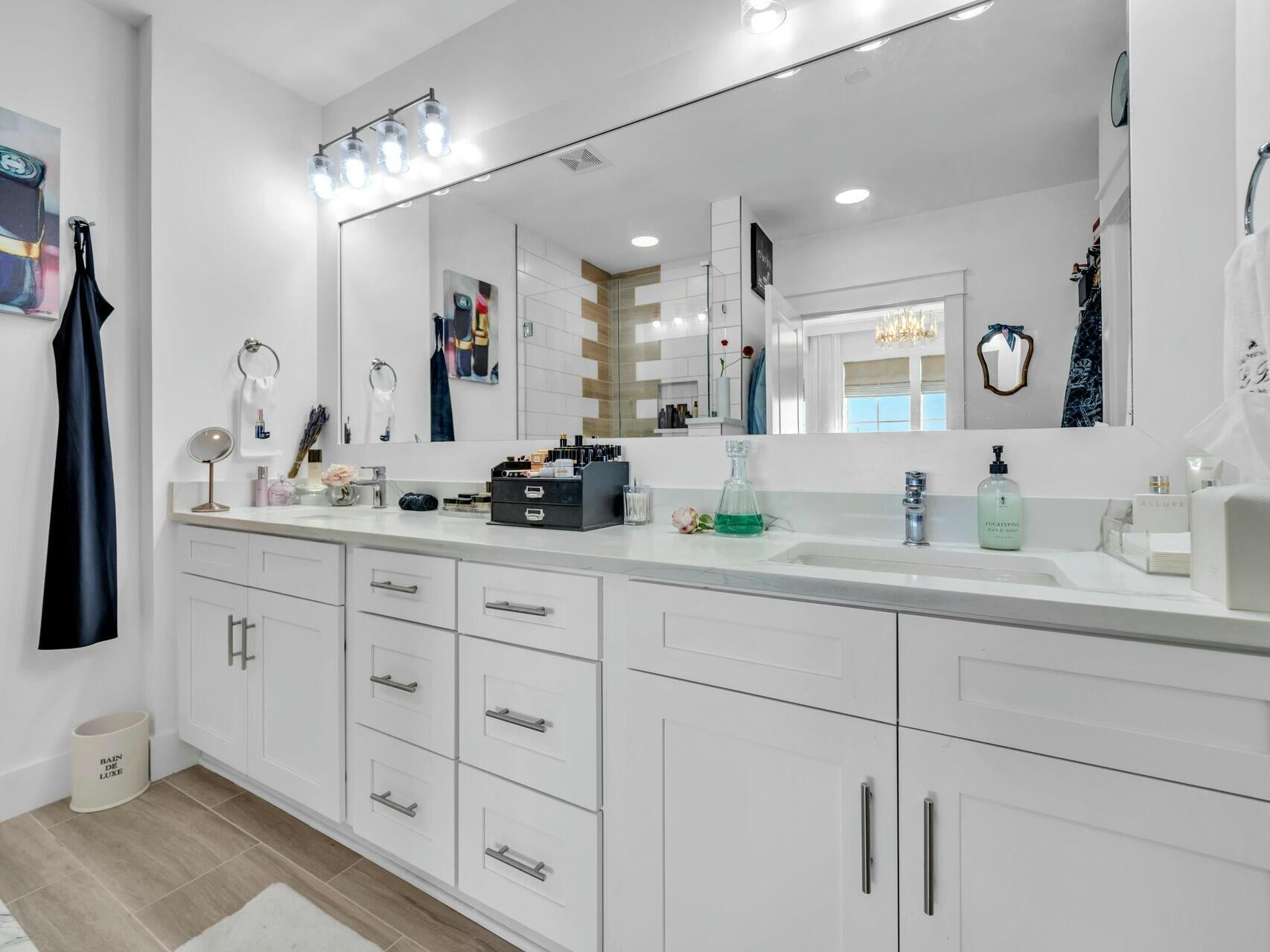 206 Henderson Resort Way, Unit 5202 Destin, FL 32541 - Photo 23 of 55 a spacious bathroom with double sink and a mirror