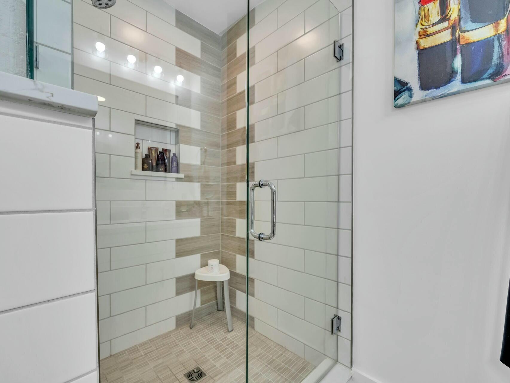 206 Henderson Resort Way, Unit 5202 Destin, FL 32541 - Photo 24 of 55 a bathroom with a shower