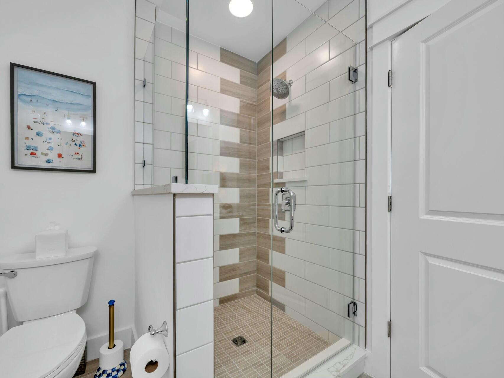 206 Henderson Resort Way, Unit 5202 Destin, FL 32541 - Photo 30 of 55 a bathroom with a shower and toilet