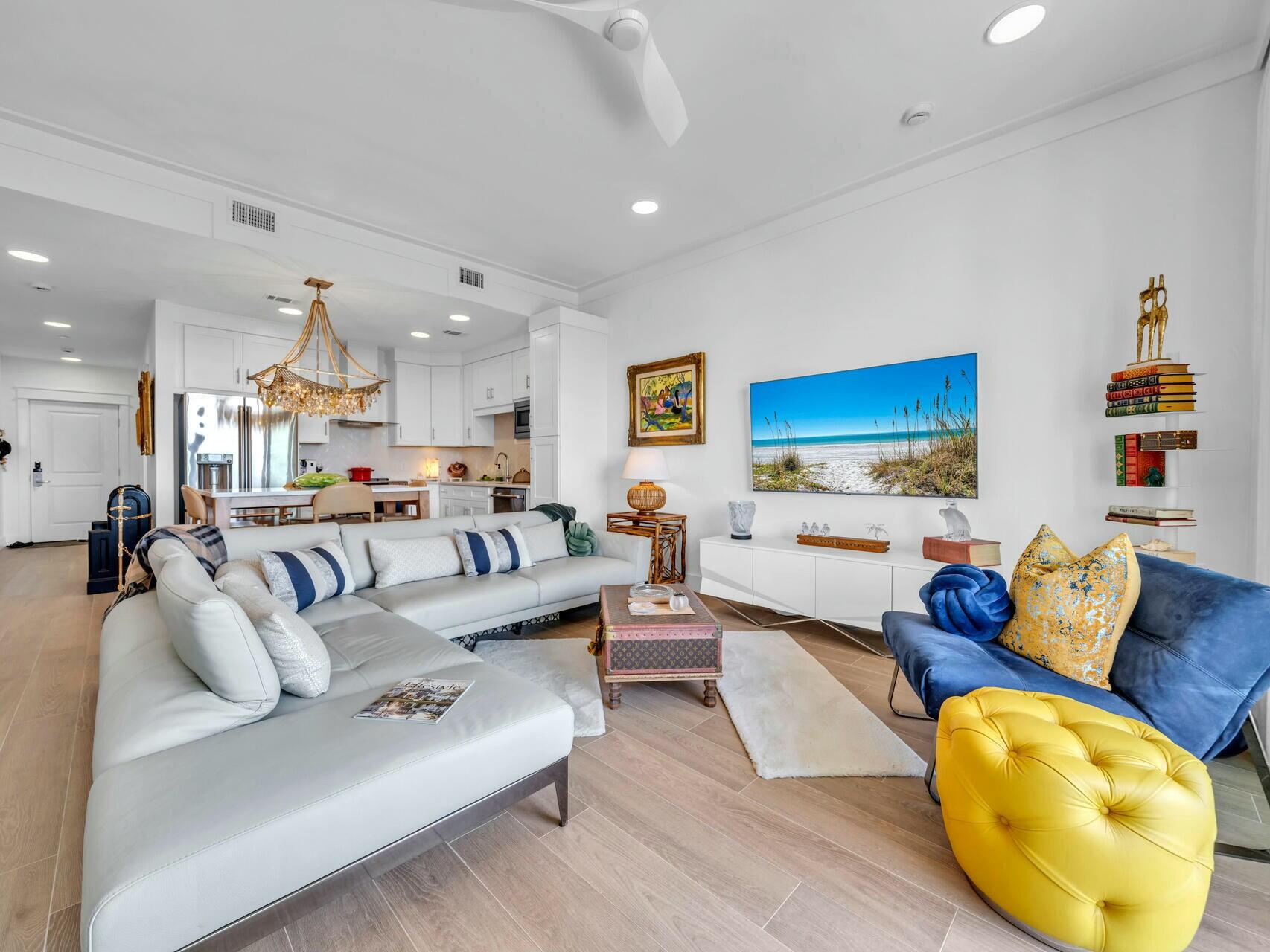 206 Henderson Resort Way, Unit 5202 Destin, FL 32541 - Photo 3 of 55 a living room with furniture kitchen view and a chandelier