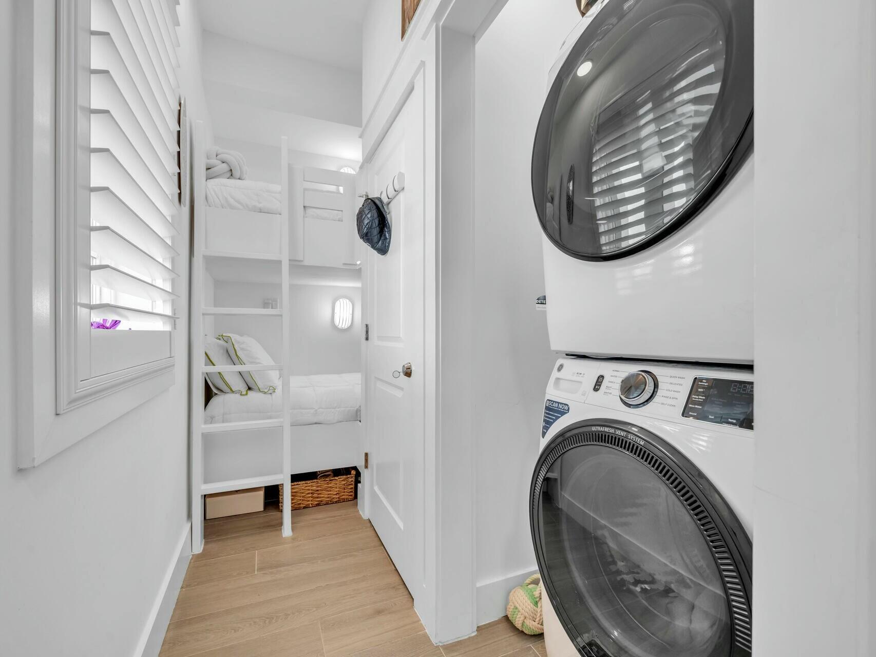 206 Henderson Resort Way, Unit 5202 Destin, FL 32541 - Photo 34 of 55 a view of a livingroom with washer and dryer
