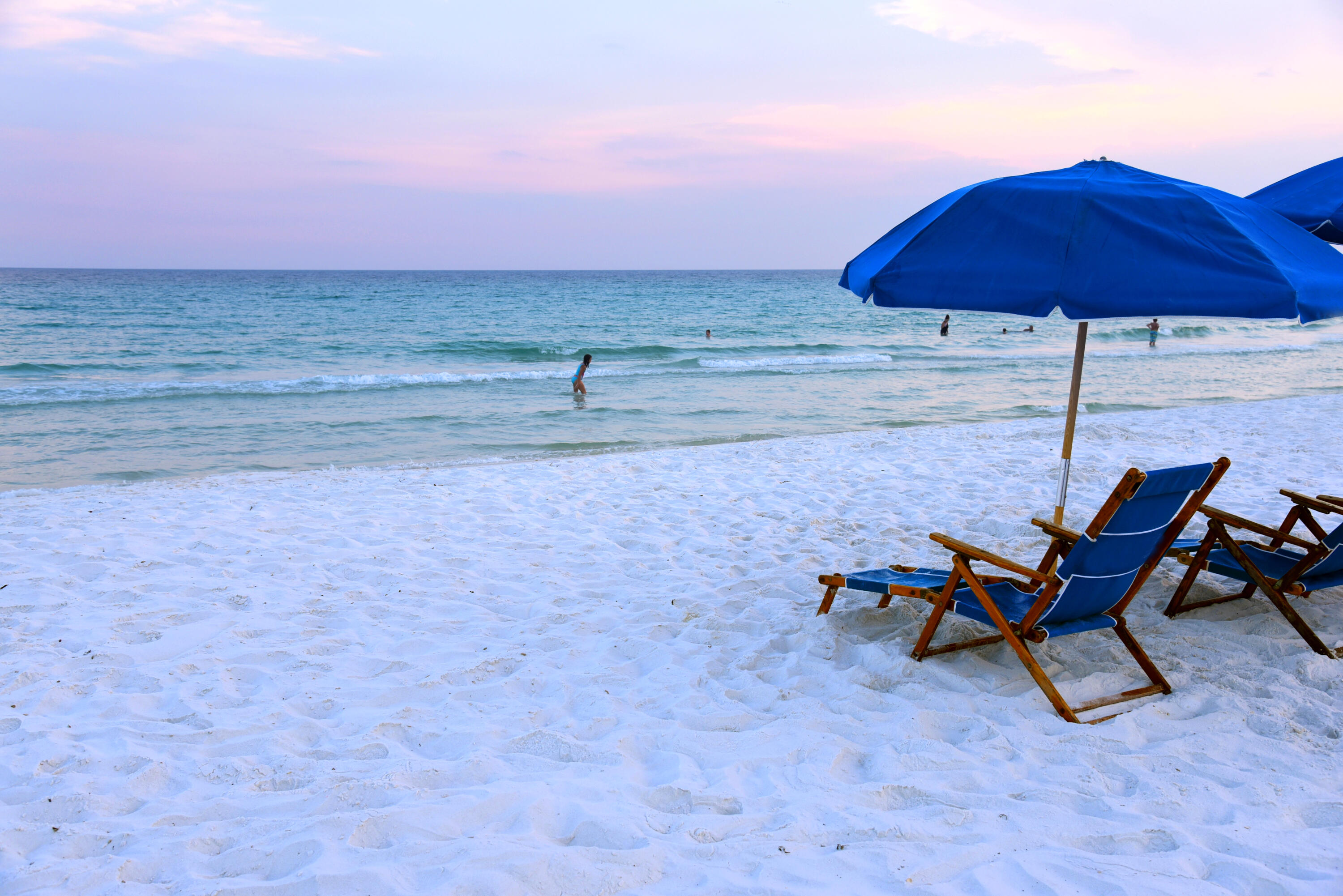 206 Henderson Resort Way, Unit 5202 Destin, FL 32541 - Photo 44 of 55 a view of a lawn chairs under an umbrella in the patio