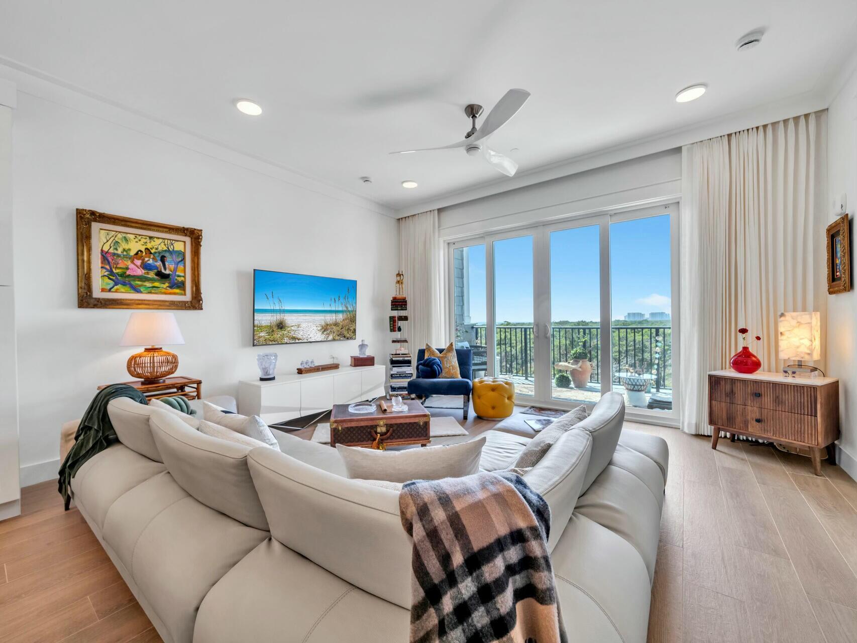 206 Henderson Resort Way, Unit 5202 Destin, FL 32541 - Photo 8 of 55 a living room with furniture and a large window