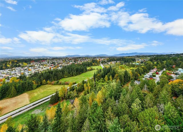 a view of an outdoor space and a lake view in back