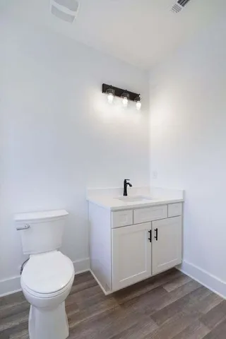 a bathroom with a sink and a toilet