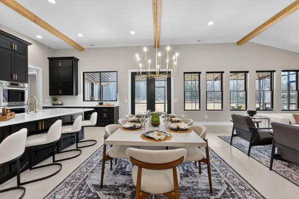 a living room with furniture and a table