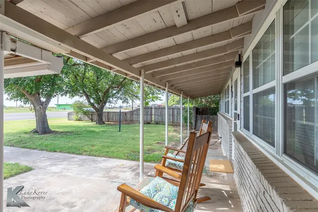 a house view with a sitting space and garden view