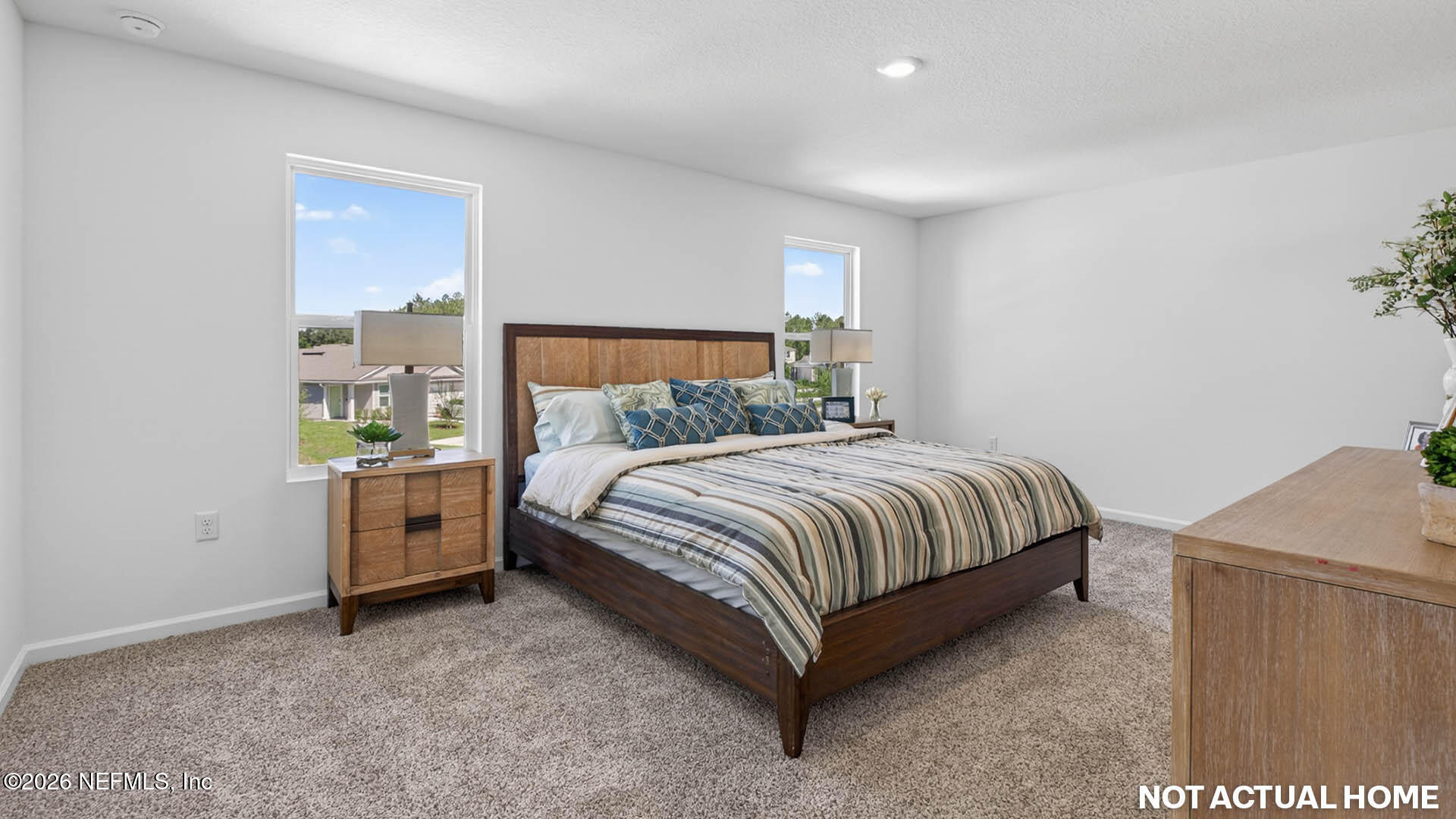 12095 Yew Tree Road Jacksonville, FL 32218 - Photo 16 of 61 a bed room with a bed and window