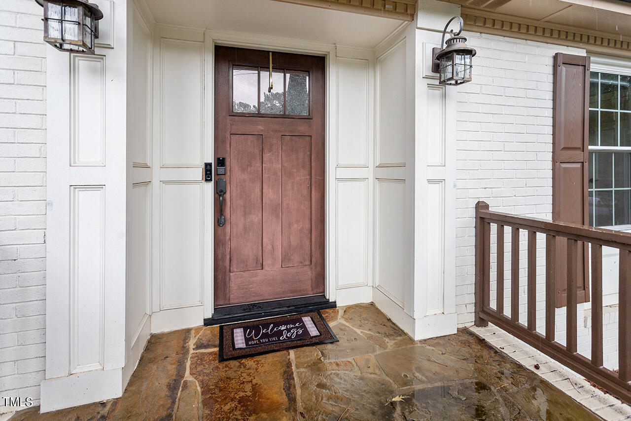 4918 Quail Hollow Drive Raleigh, NC 27609 - Photo 2 of 36 a view of bathroom with a sink and a mirror