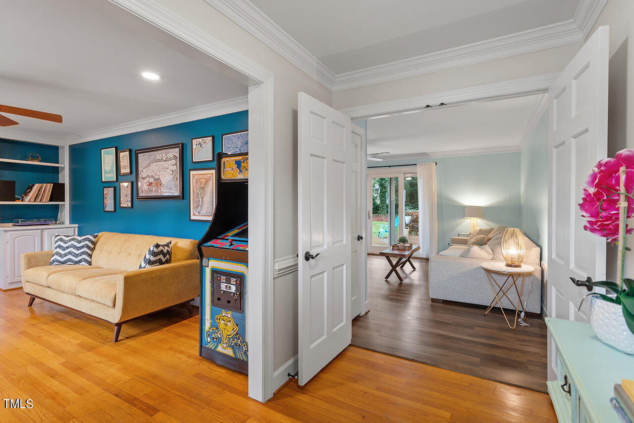 4918 Quail Hollow Drive Raleigh, NC 27609 - Photo 3 of 36 a living room with furniture and a wooden floor