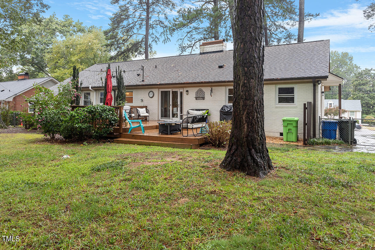 4918 Quail Hollow Drive Raleigh, NC 27609 - Photo 34 of 36 a house view with a sitting space and garden