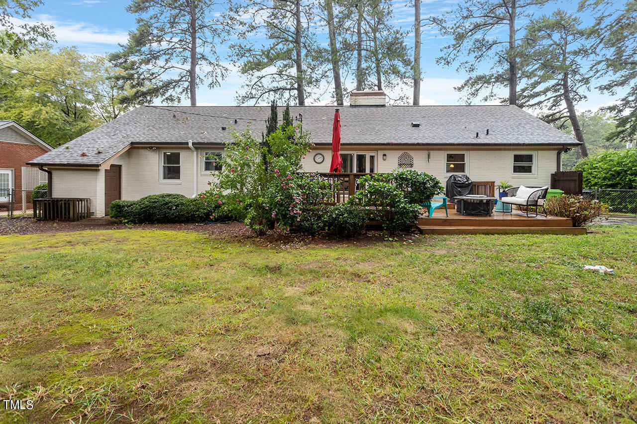 4918 Quail Hollow Drive Raleigh, NC 27609 - Photo 35 of 36 a front view of a house with garden