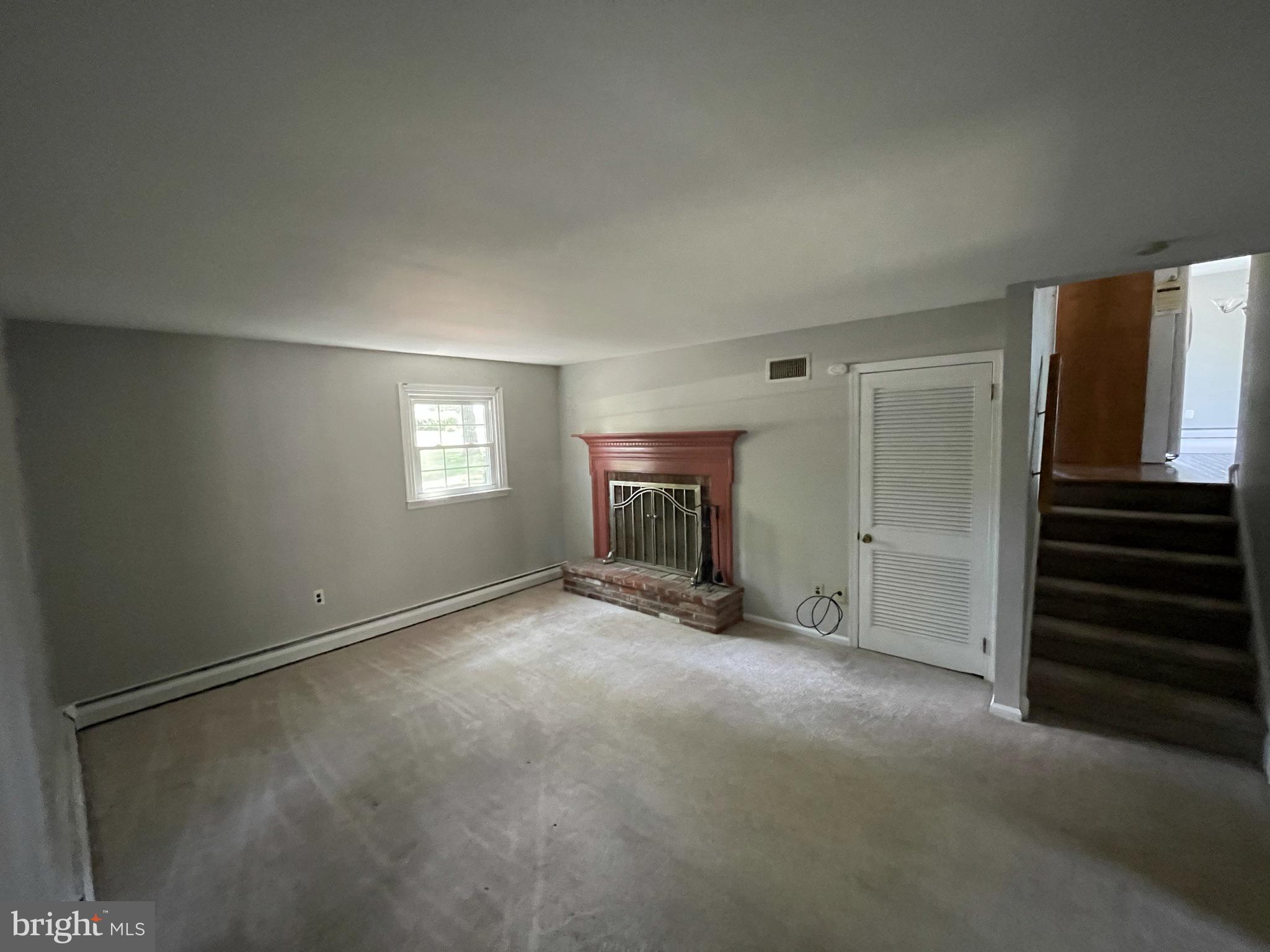 53 Sandown Road Norristown, PA 19403 - Photo 17 of 21 first floor den with fireplace