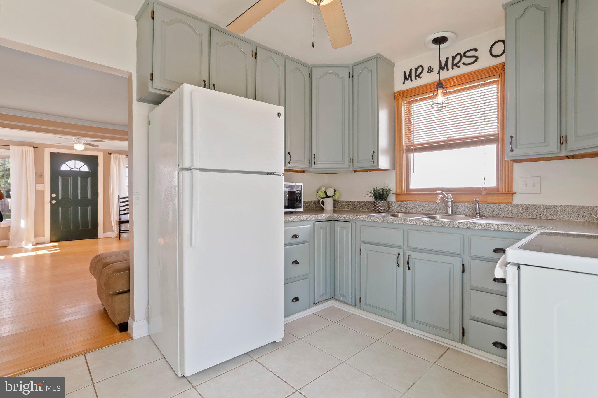 211 Lake Road Pasadena, MD 21122 - Photo 7 of 30 Galley kitchen w storage