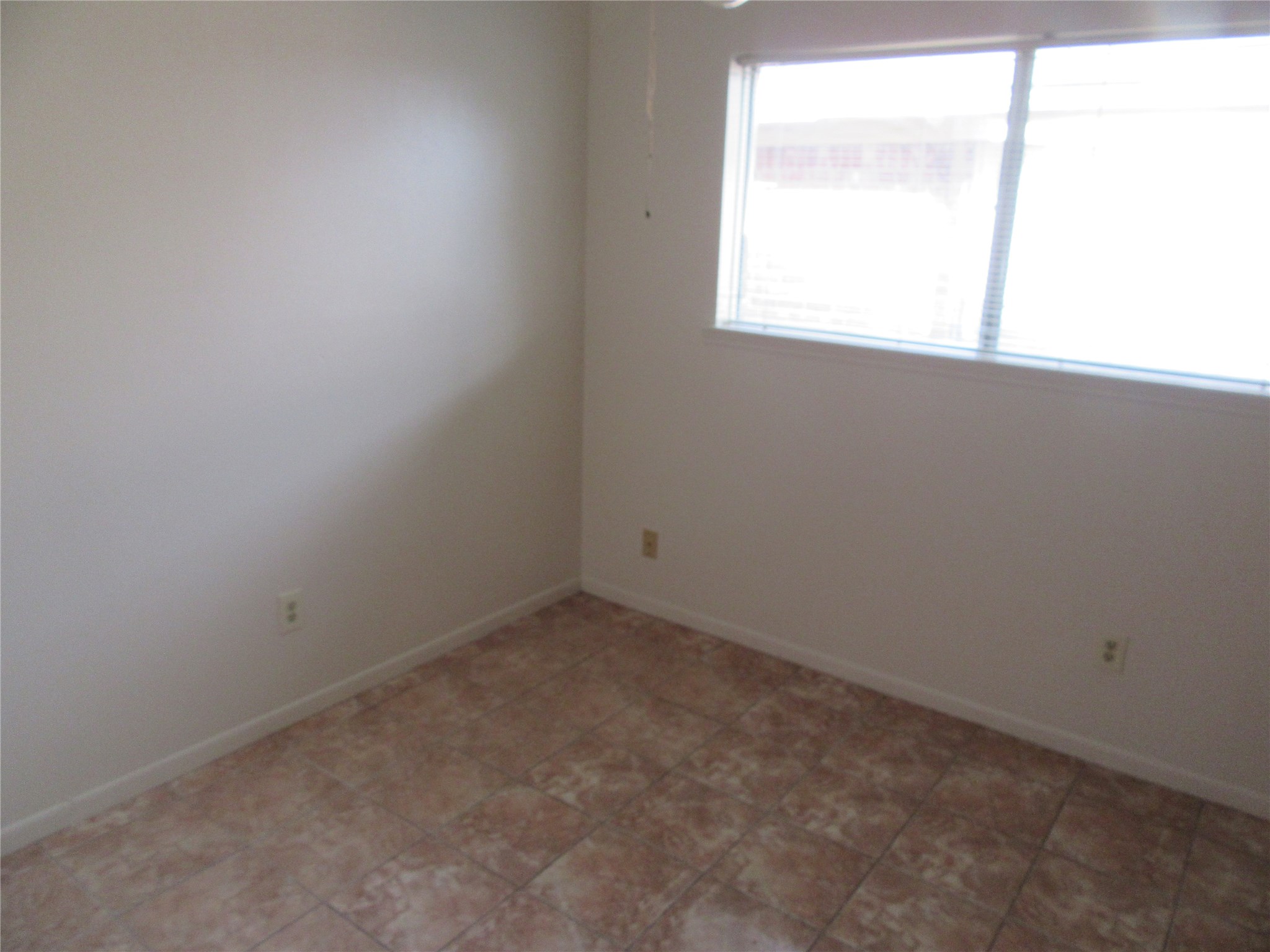12215 Pompano Lane Houston, TX 77072 - Photo 14 of 15 an empty room with a window