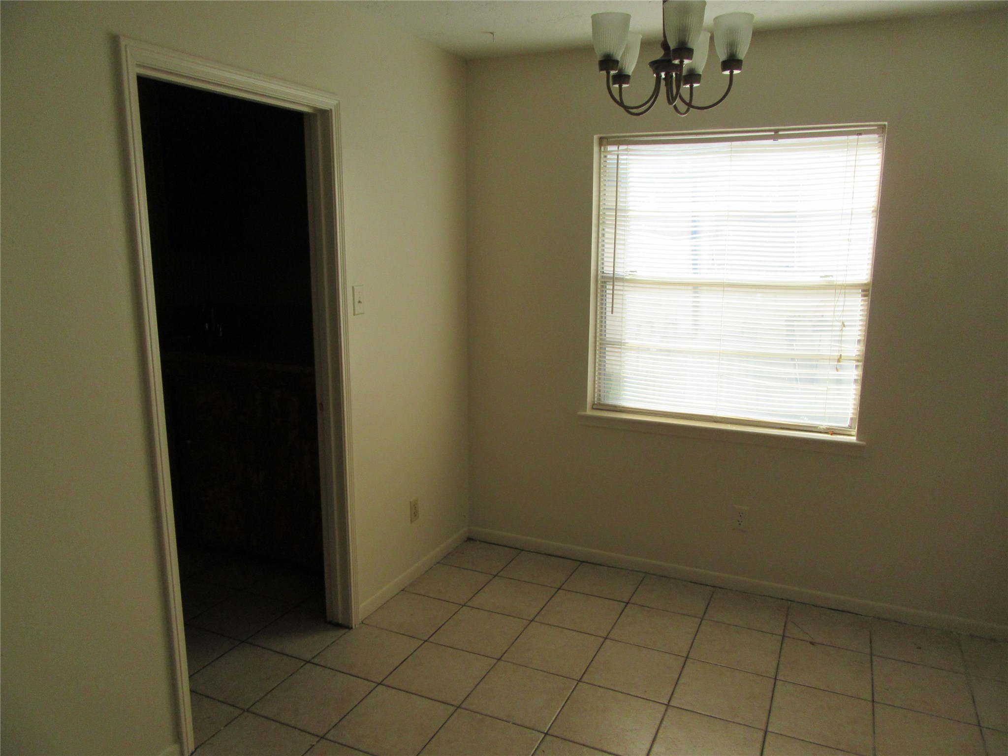 12215 Pompano Lane Houston, TX 77072 - Photo 8 of 15 a view of an empty room with a window