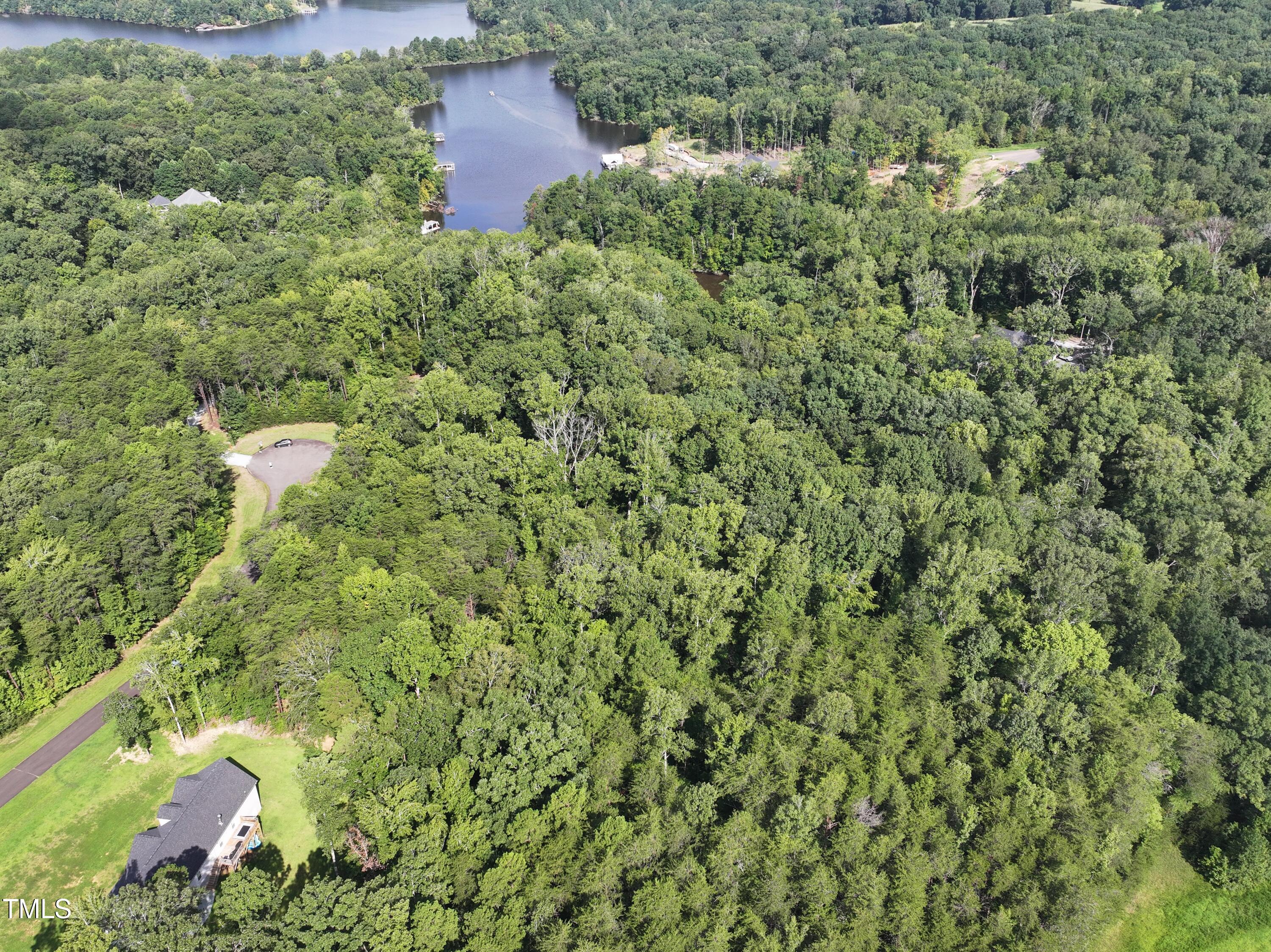 Lot 19 Ferncrest Court Roxboro, NC 27574 - Photo 11 of 11 an aerial view of residential house with outdoor space and trees all around
