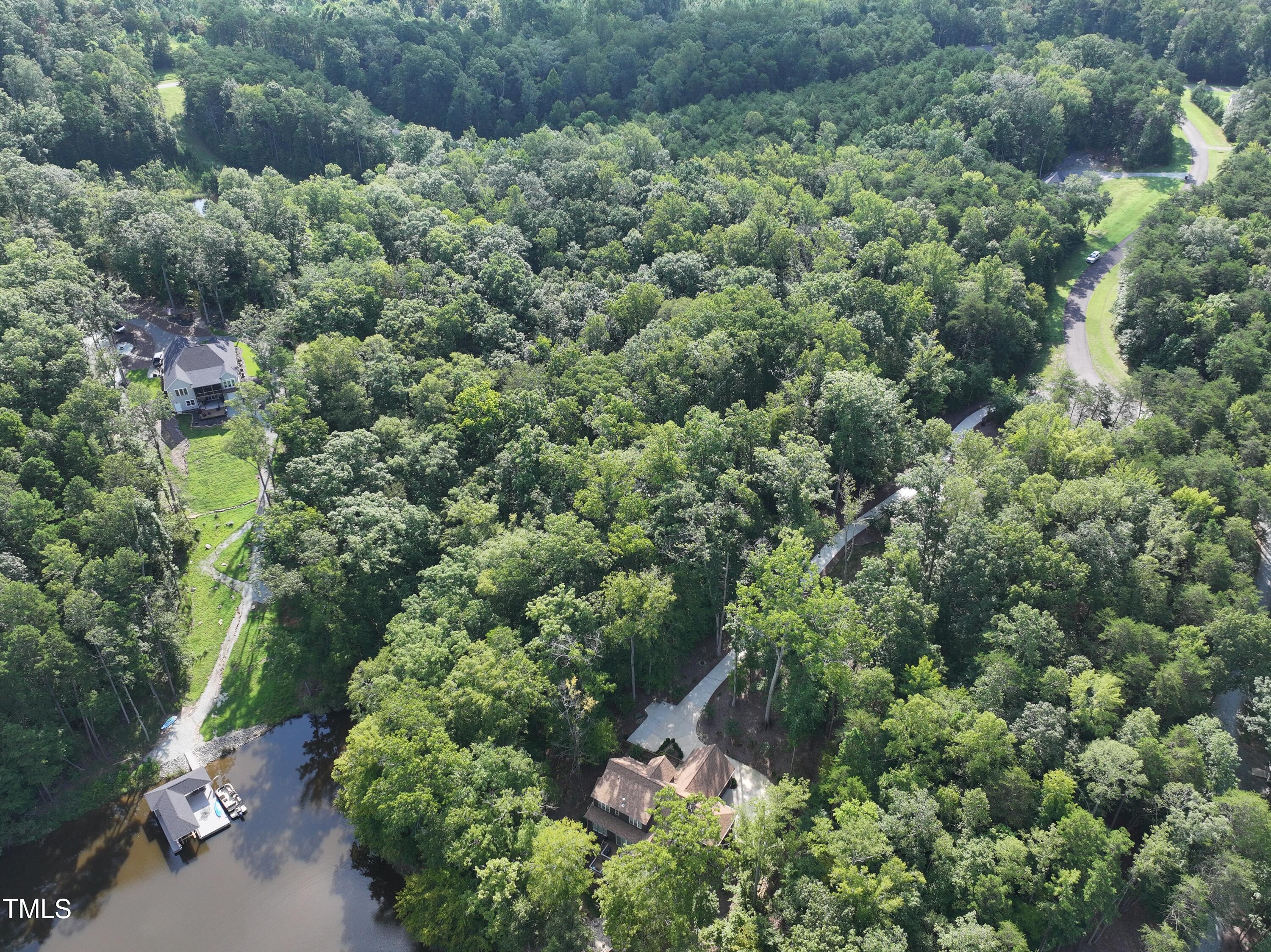 Lot 19 Ferncrest Court Roxboro, NC 27574 - Photo 8 of 11 an aerial view of residential house with outdoor space and trees all around