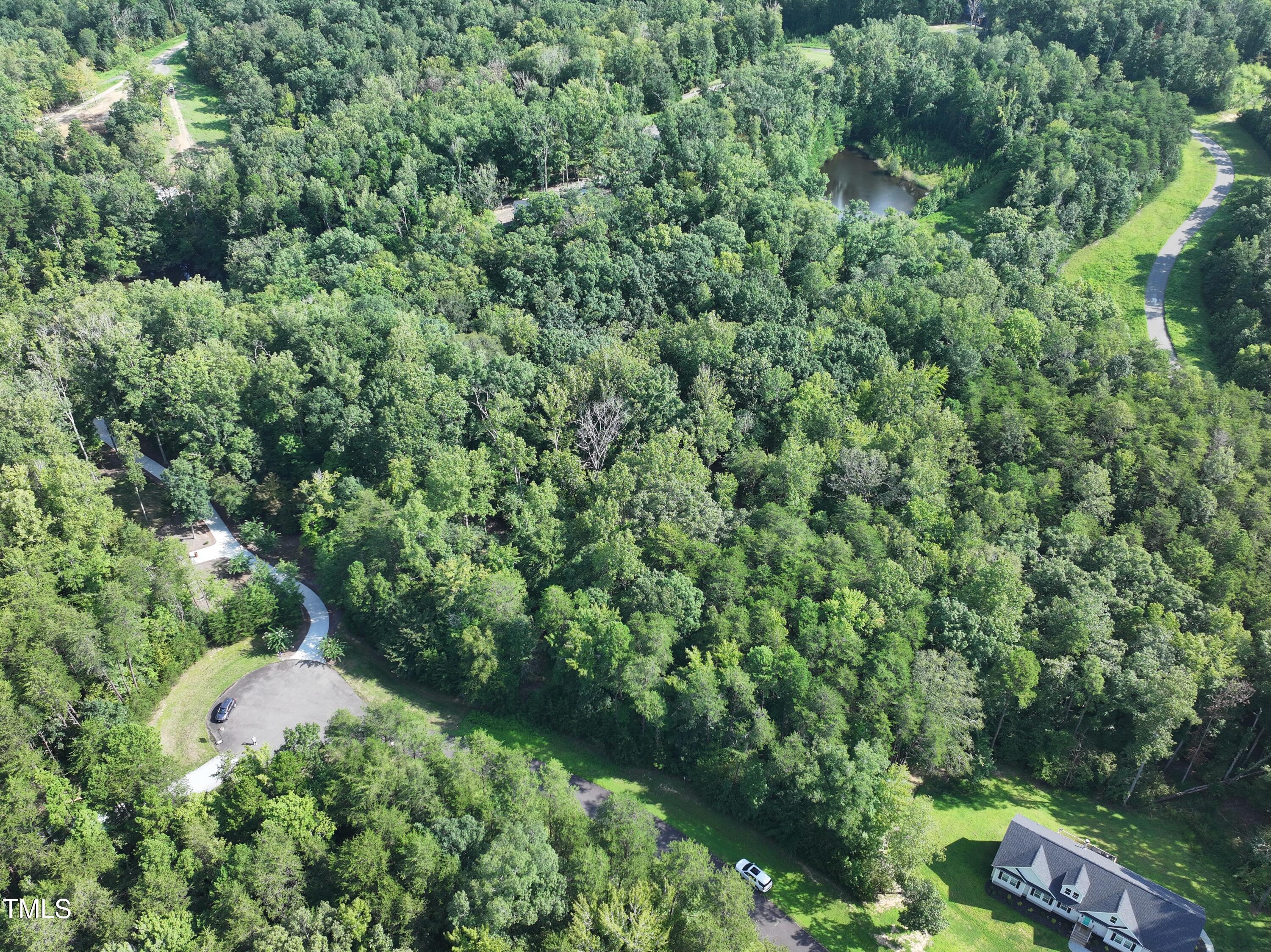 Lot 19 Ferncrest Court Roxboro, NC 27574 - Photo 10 of 11 an aerial view of residential house with outdoor space and trees all around