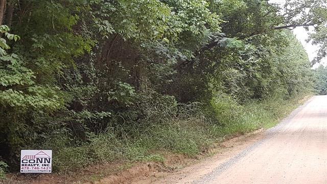 698 Comer Road Gray, GA 31032 - Photo 1 of 2 a view of a dry yard with trees