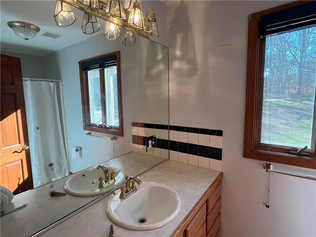 83 Old Post Road Westerly, RI 02891 - Photo 17 of 28 full bathroom with tub on first floor