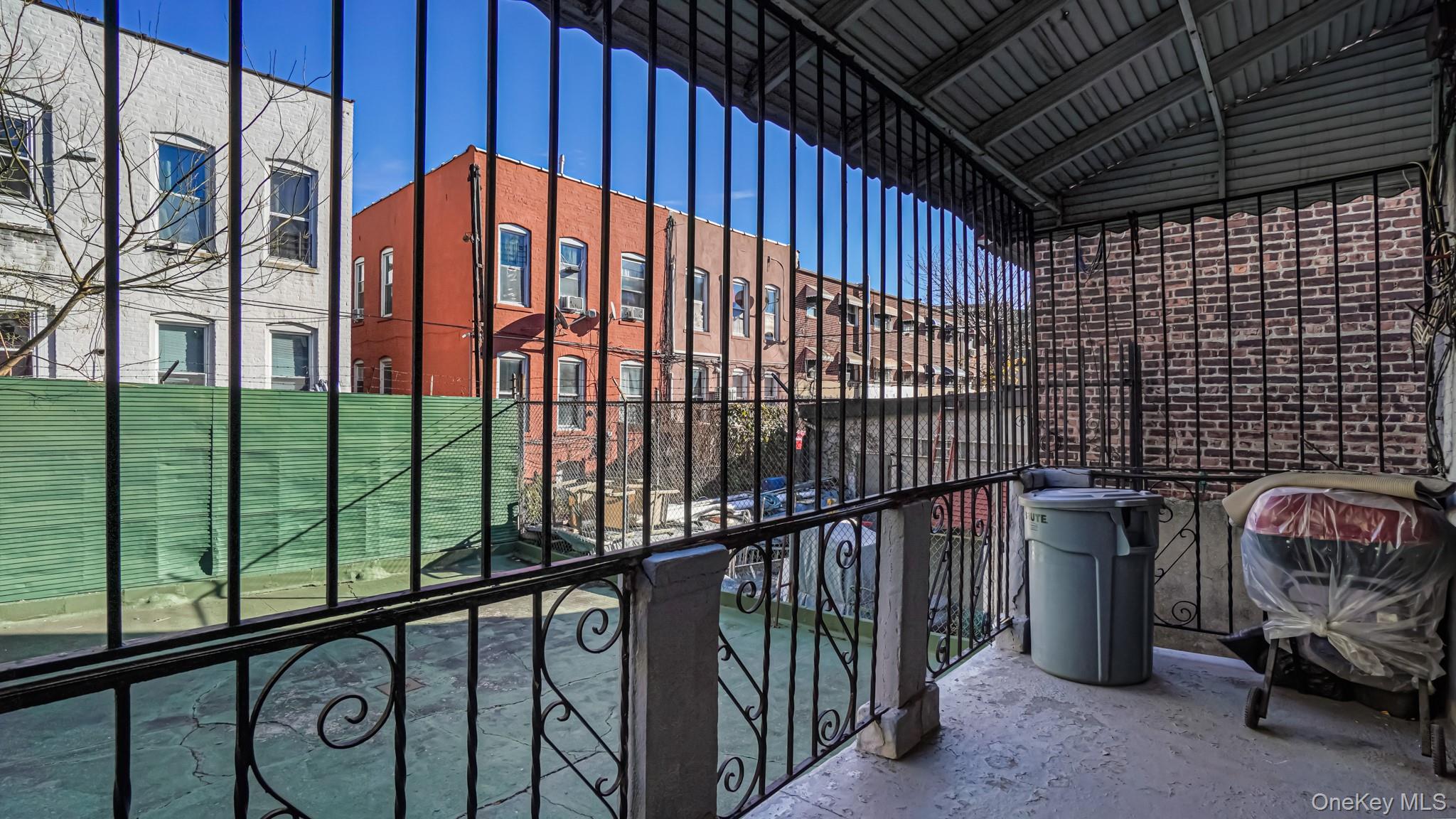 1270 Rosedale Avenue Bronx, NY 10472 - Photo 8 of 19 a view of a porch with wooden floor
