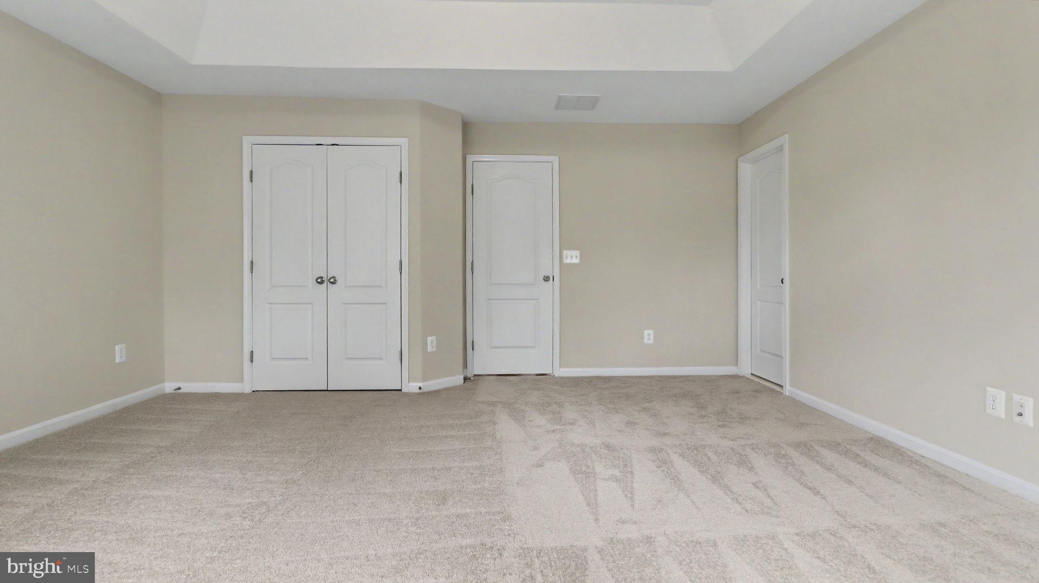42371 Trellis Square Brambleton, VA 20148 - Photo 46 of 70 Spacious room with soft, neutral tones.