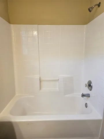 a bathroom with a bathtub