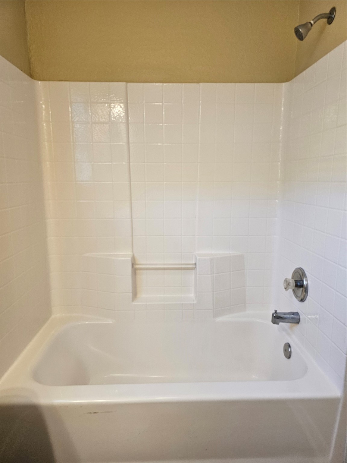 4426 25th Street East, Unit C Dickinson, TX 77539 - Photo 11 of 31 a bathroom with a bathtub