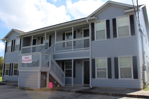 4426 25th Street East, Unit C Dickinson, TX 77539 - Photo 2 of 31 a front view of a house