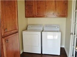 4426 25th Street East, Unit C Dickinson, TX 77539 - Photo 7 of 31 a utility room with dryer and washer