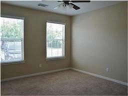 4426 25th Street East, Unit C Dickinson, TX 77539 - Photo 10 of 31 an empty room with a window