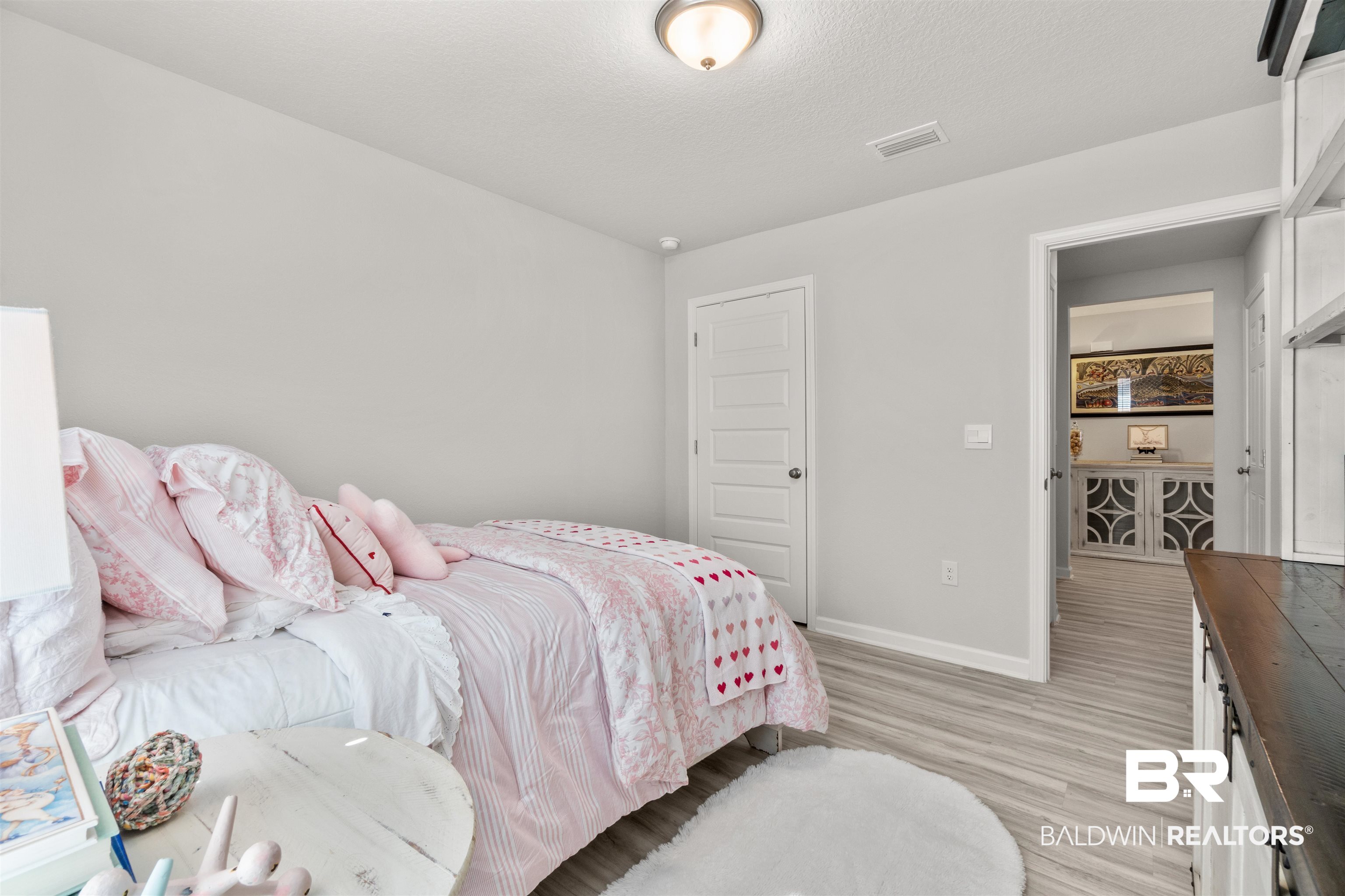 24472 Ringneck Loop Elberta, AL 36530 - Photo 26 of 46 Bedroom with light wood-type flooring