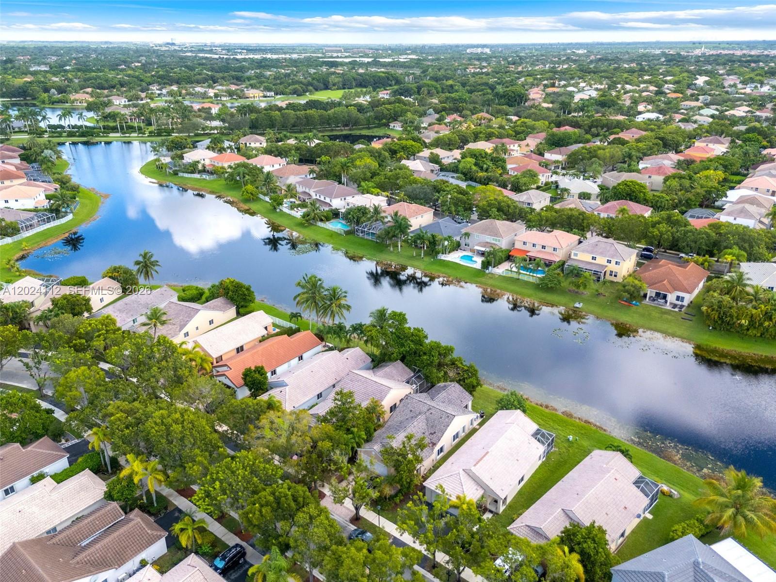 4366 Mahogany Ridge Drive Weston, FL 33331 - Photo 30 of 41 an aerial view of residential houses with outdoor space