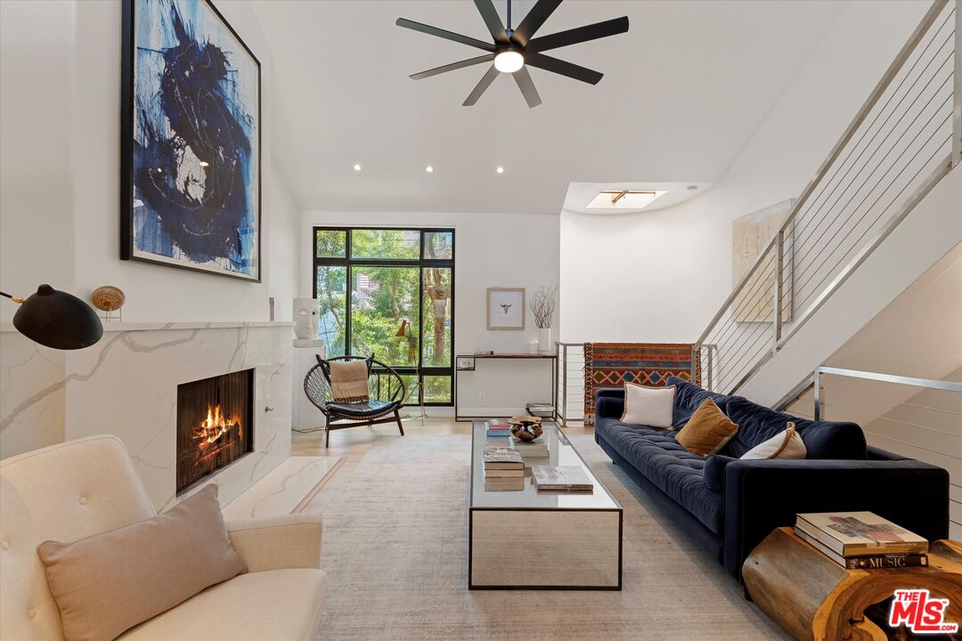 2108 Neilson Way Santa Monica, CA 90405 - Photo 18 of 70 a living room with furniture and a fireplace