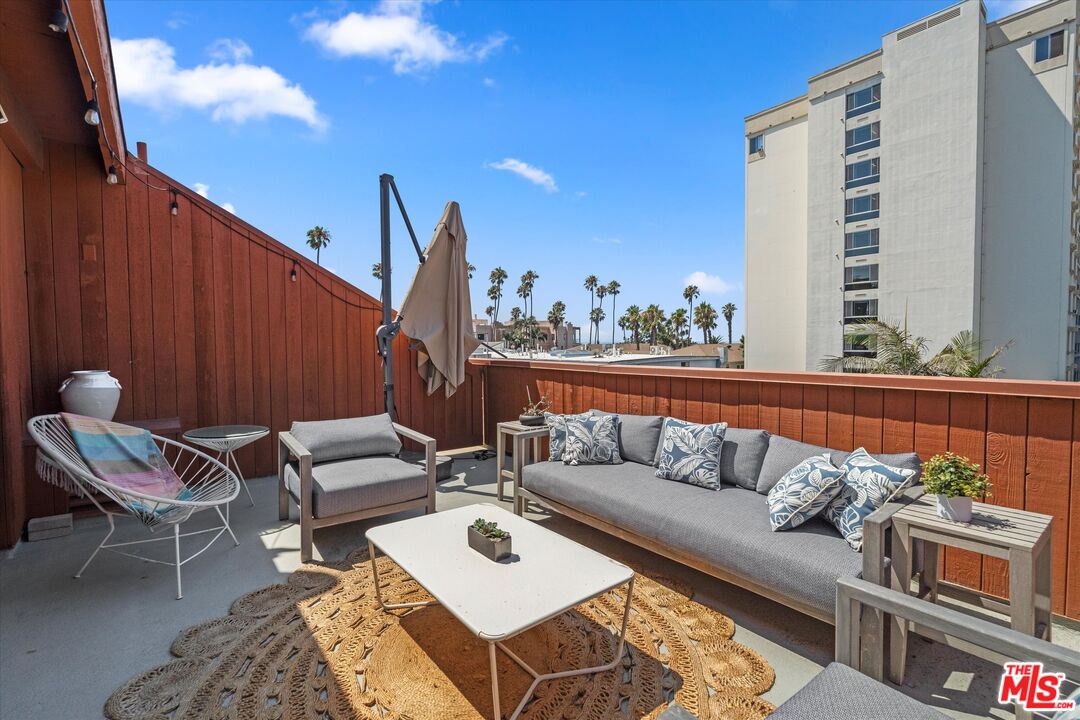 2108 Neilson Way Santa Monica, CA 90405 - Photo 26 of 70 a view of a terrace with couches and potted plants
