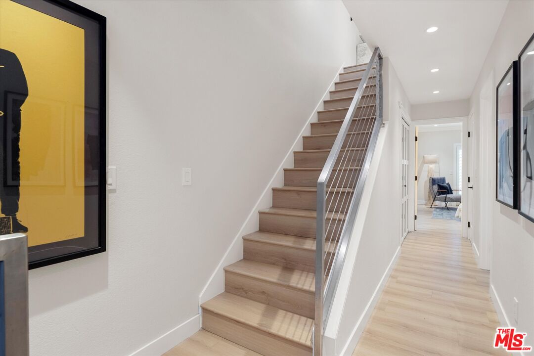 2108 Neilson Way Santa Monica, CA 90405 - Photo 33 of 70 a view of a hallway with wooden floor and entryway