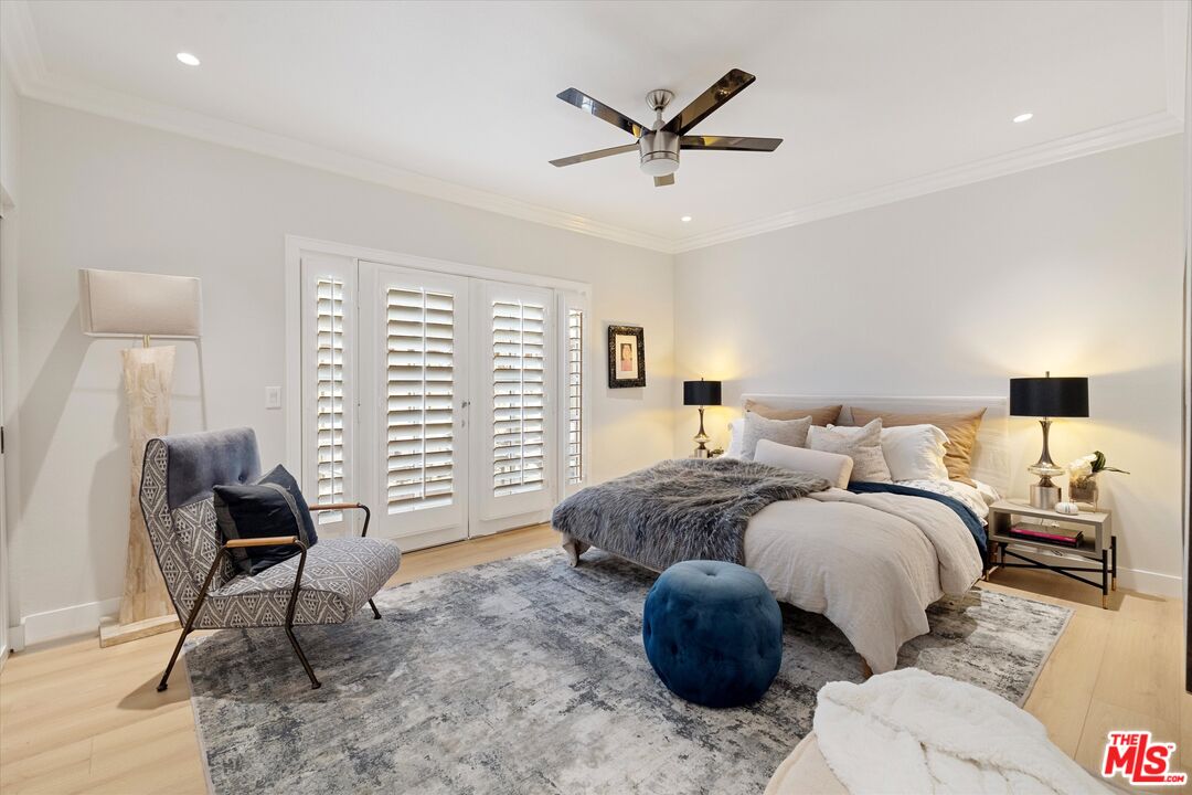 2108 Neilson Way Santa Monica, CA 90405 - Photo 37 of 70 a bedroom with a bed and chair