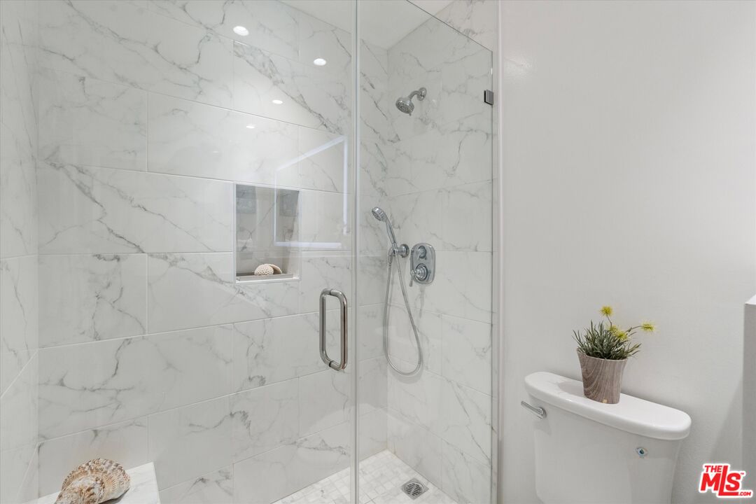 2108 Neilson Way Santa Monica, CA 90405 - Photo 43 of 70 a bathroom with a shower