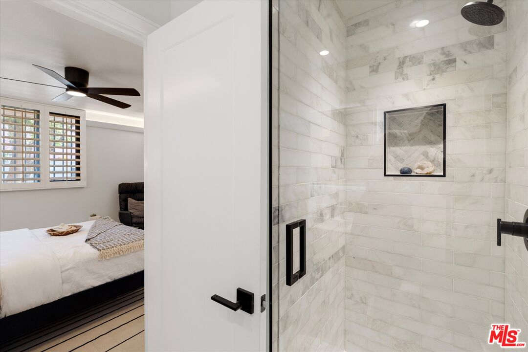2108 Neilson Way Santa Monica, CA 90405 - Photo 47 of 70 a bathroom with a bathtub and a shower