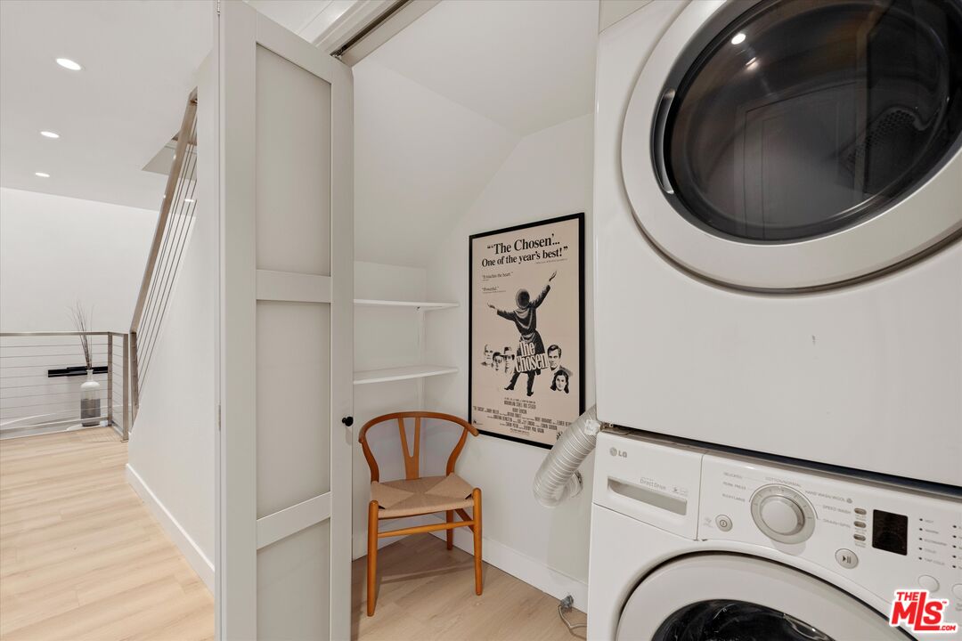 2108 Neilson Way Santa Monica, CA 90405 - Photo 48 of 70 a view of a hallway with washer and dryer