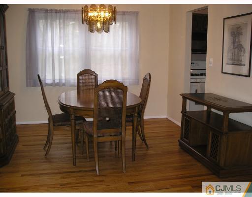 11 Amman Road Edison, NJ 08817 - Photo 4 of 10 a dining room with furniture and window
