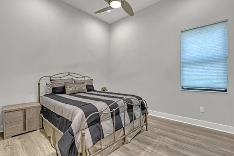 a bedroom with a bed and a cabinets