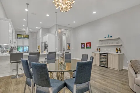 a view of kitchen with cabinets and wooden floor