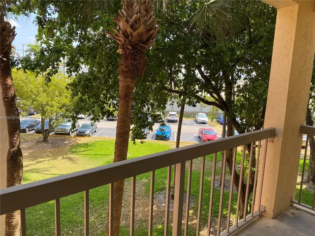 a view of swimming pool from a balcony