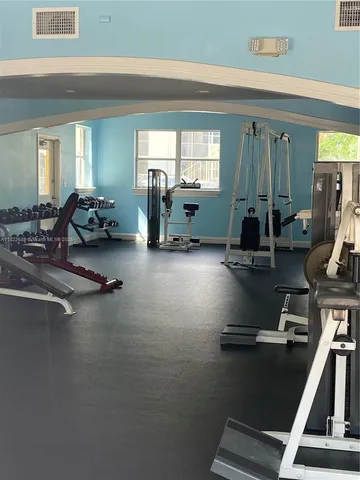 a view of a room with gym equipment