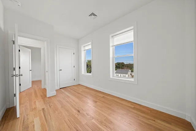 a view of an empty room and window