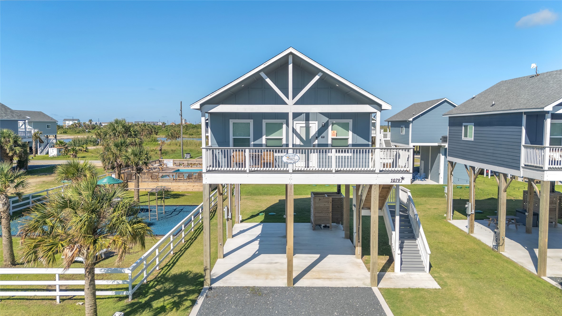 a view of a house with swimming pool