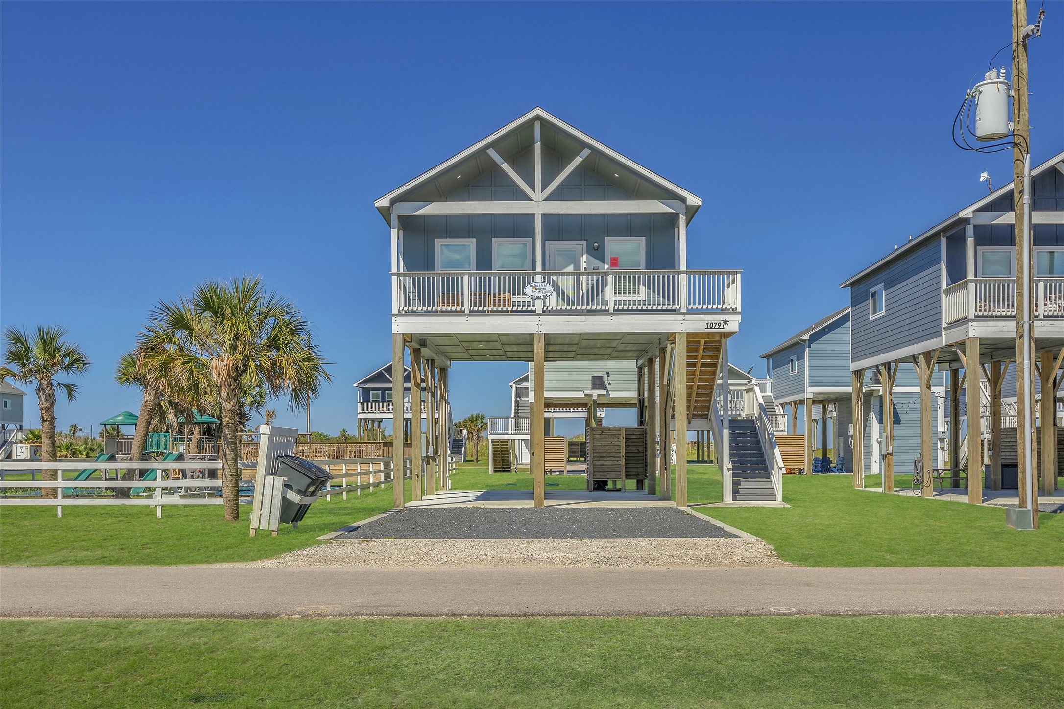 1079 Cedar Lane Port Bolivar, TX 77650 - Photo 14 of 39 a front view of a house with a yard